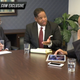 Tyrone Hankerson Jr.; his attorney, James Walker; and Roland Martin